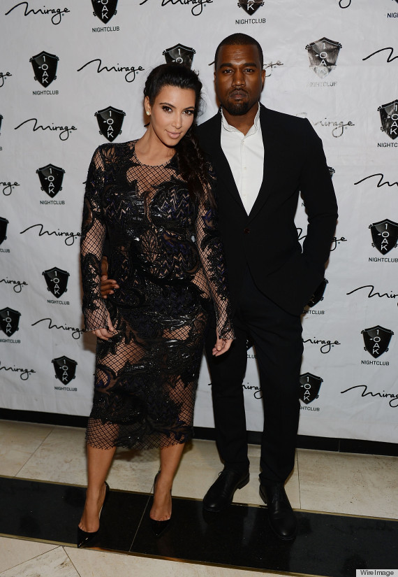LAS VEGAS, NV - DECEMBER 31: Kim Kardashian and Kanye West arrive for the New Year;s Eve countdown at 1 OAK Nightclub At The Mirage on December 31, 2012 in Las Vegas, Nevada. (Photo by Denise Truscello/WireImage)